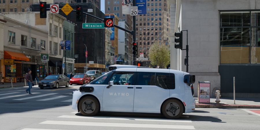 Archive: Waymo Ojai autonomous robotaxi (Zeekr-built, sixth-generation Waymo Driver) on Mission Street, downtown San Francisco, 23 Jul 2026 (Daniel Lu / dllu, CC BY-SA 4.0). Not the 14 September 2026 Las Vegas public-invite opening, not a Strip / Allegiant / Chinatown / UNLV / Spring Valley day-of still, and not an NTA ceremony photo.