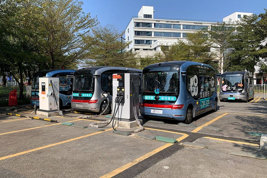 Archive: WeRide Mini Robobus autonomous electric shuttle in service on Guangzhou International Biotech Island, 24 Jan 2023 (Tim Wu, CC BY-SA 4.0). Not Zürich Airport apron operation, not Flughafen Zürich / Swissport / Krummen Kerzers remote-cockpit L4 runs of September 2026, and not a ZRH employee shuttle still.