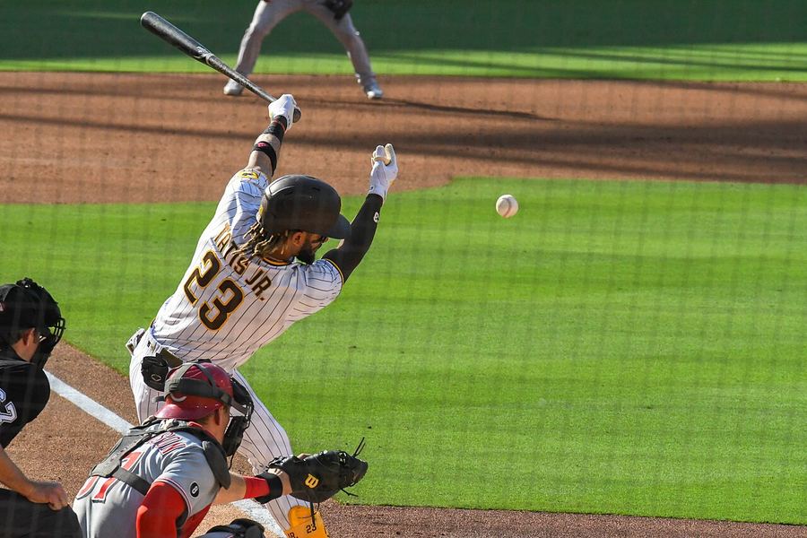 Archive: Fernando Tatis Jr. mid-swing follow-through #23, Padres white home pinstripes, Petco-style action vs Reds, 19 Jun 2021 (Ryan Casey Aguinaldo / Wikimedia Commons, CC BY-SA 4.0). Not the 19 September 2026 Padres–Marlins 10th walk-off at Petco Park, not a Salas walk-off still, and not a day-of Marlins series celebrate.