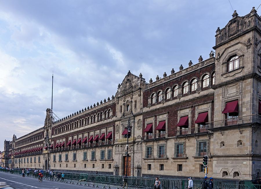 Archive: Front facade of the Palacio Nacional (National Palace), Mexico City, from the southwest — red awnings and stone arcade. Daniel Case, License CC BY-SA 3.0. Not the 24 September 2026 summit, not day-of photography of the two presidents, and not a treaty signing; the revised treaty has not been signed.