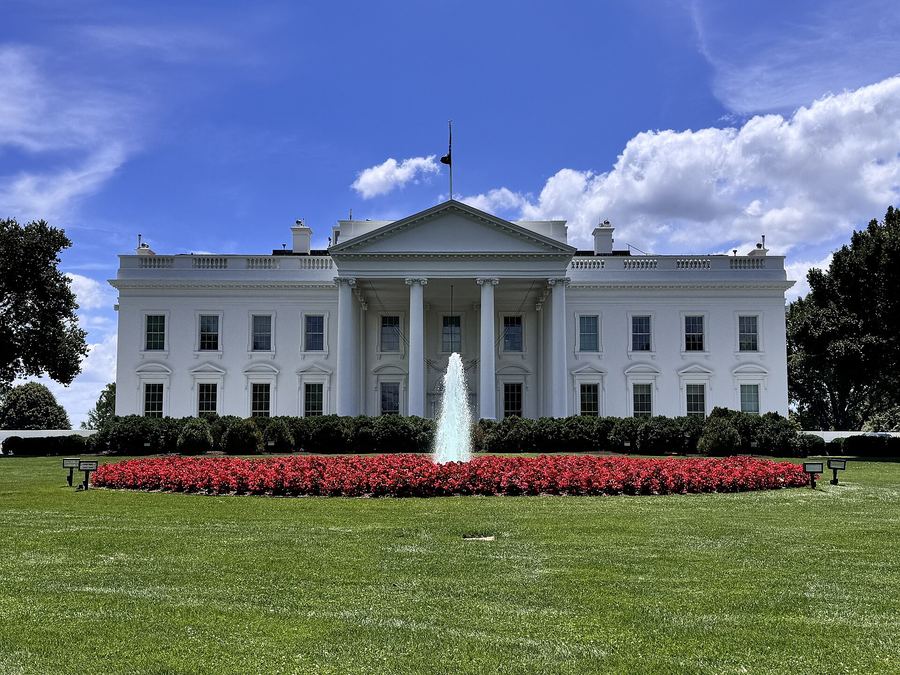 Archive photo: the White House north façade from Lafayette Square, June 2024. The East Room lunch and signing were on 29 September 2026.
