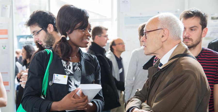 Archive photo: Henri Kagan, one of the two winners, talks with young chemists at a French organic chemistry meeting dedicated to him at the École Polytechnique near Paris in September 2013.