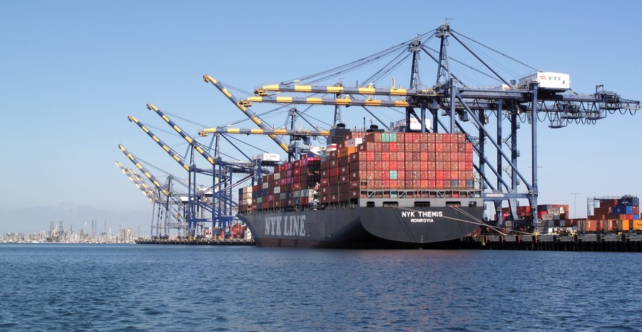 Archive photo: cranes work the container ship NYK Themis at the Port of Los Angeles in September 2021.