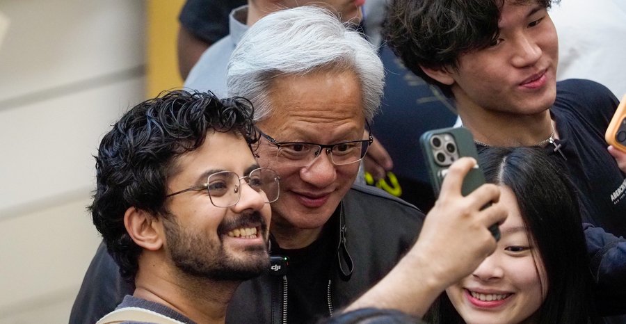 Archive photo: Nvidia founder and chief executive Jensen Huang poses for selfies with students after a talk at Stanford University in April 2026.