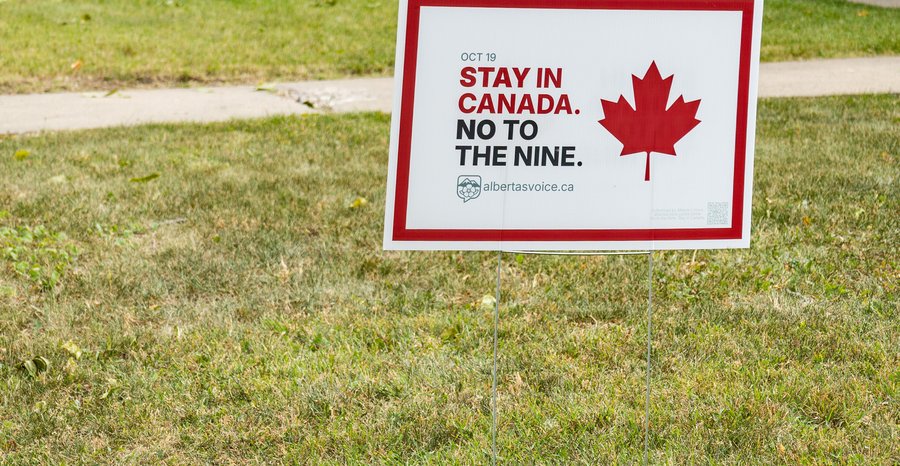 A lawn sign in Edmonton urging a vote to stay in Canada and against the other nine referendum questions, in September 2026.