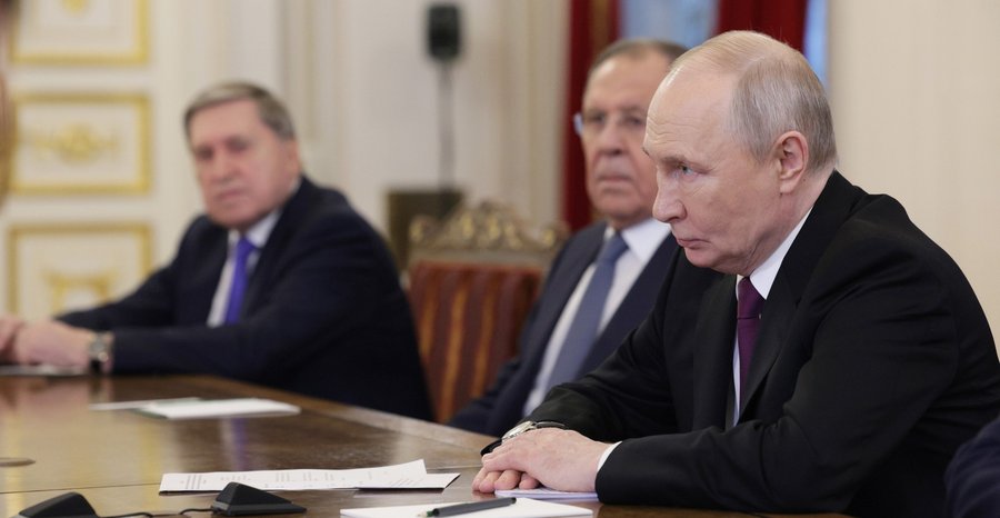 Russian Foreign Minister Sergey Lavrov, center, beside President Vladimir Putin at a meeting with Iran's foreign minister, Abbas Araghchi, in April 2026.