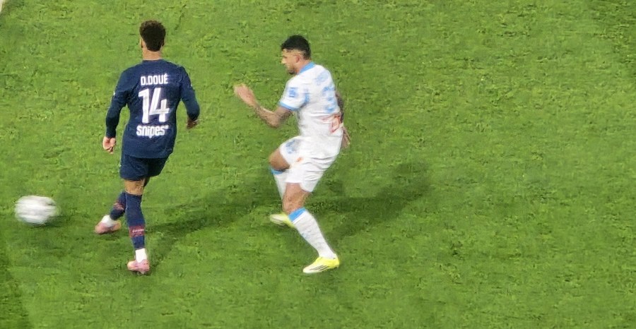 Désiré Doué carries the ball for Paris Saint-Germain against Marseille in February 2026.