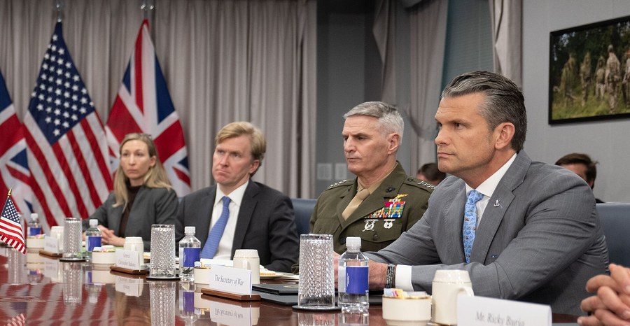 Defense Secretary Pete Hegseth, right, at a meeting at the Pentagon in October 2026.
