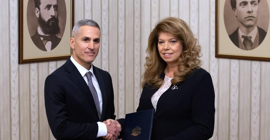 President Iliana Yotova hands Andrey Gyurov the mandate to form a caretaker cabinet in Sofia in February 2026.